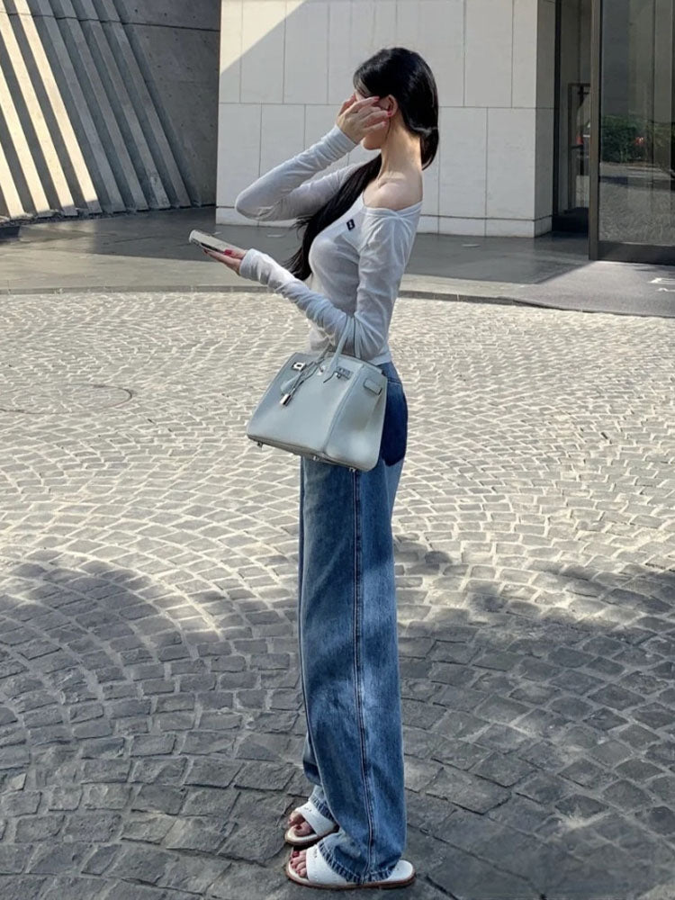 Women's new Joker fake pocket fashion old washed blue jeans Joker high waist loose straight pants.