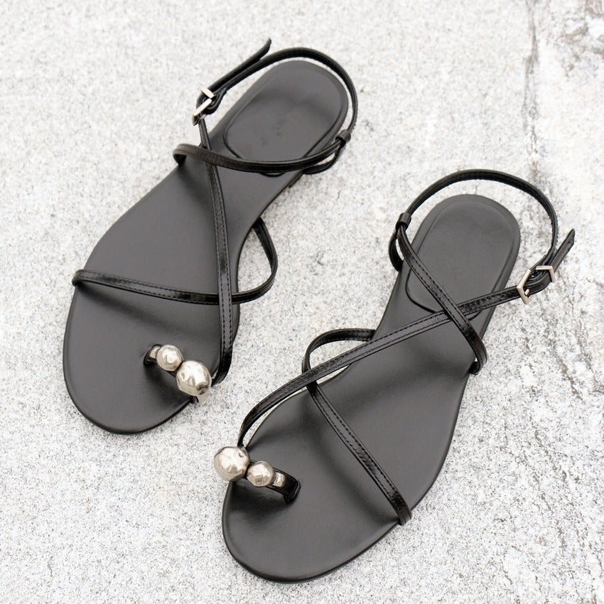 Women's 2025 Summer New Open-toed Flat-bottomed Flip-flops with Crossed Straps.