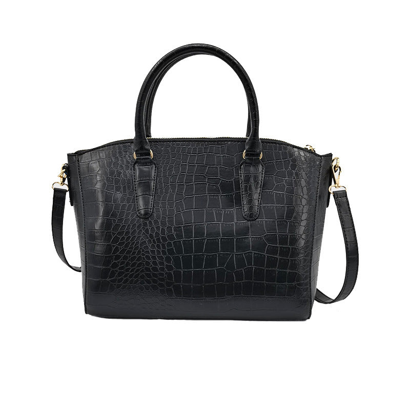 Women's New Fashion Joker Handbag Shell Slung Over One Shoulder Large Capacity Handbag. Size: Bottom Length 30cm. Bottom Width 20cm. Side Height 23cm.