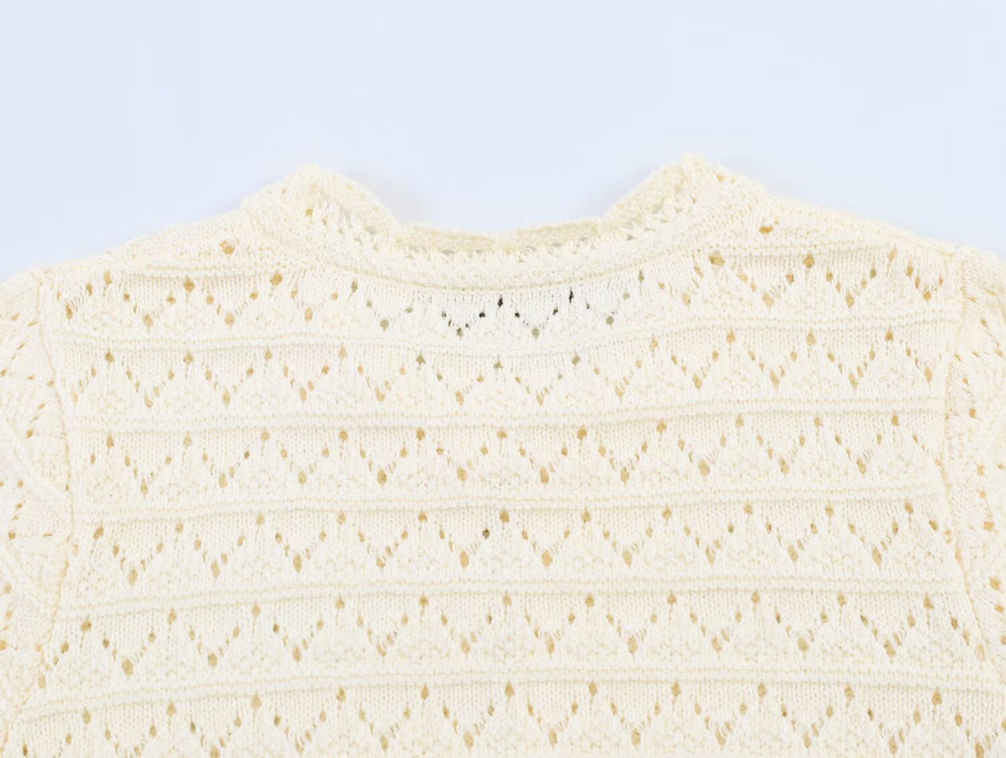Women's round neck hollow knitted Coat