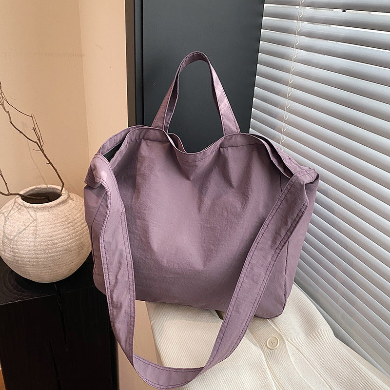 Women's New Portable Canvas Hand-held Pocket Large-capacity Leisure Joker Shoulder Slung Tote Bag