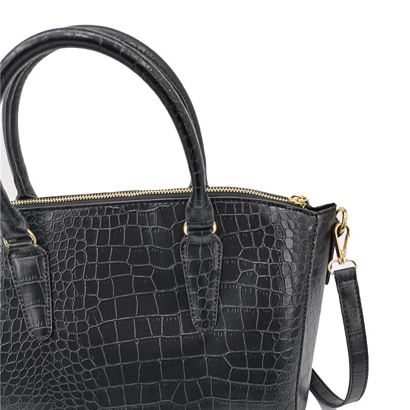 Women's New Fashion Joker Handbag Shell Slung Over One Shoulder Large Capacity Handbag. Size: Bottom Length 30cm. Bottom Width 20cm. Side Height 23cm.