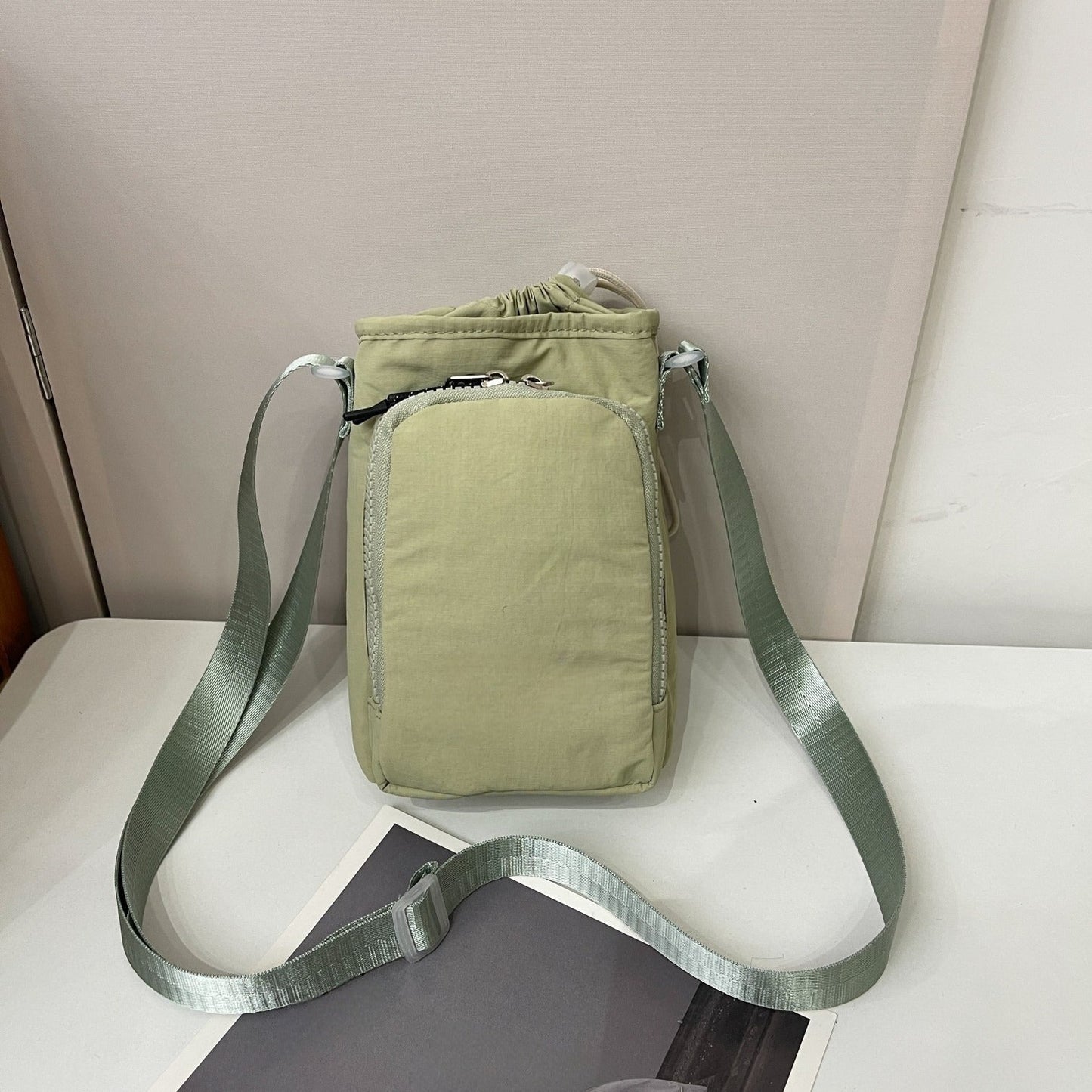 Men's and Women's Leisure Versatile Sports Adjustable Shoulder Strap Multifunctional Water Cup Mobile Phone Messenger Bag