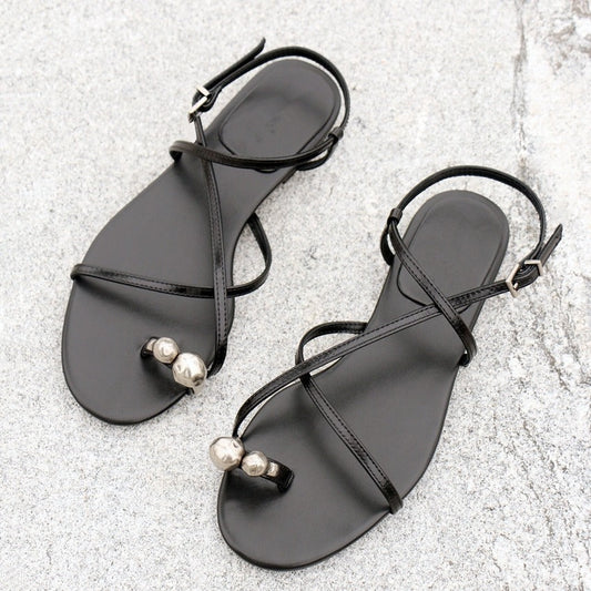 Women's 2025 Summer New Open-toed Flat-bottomed Flip-flops with Crossed Straps.