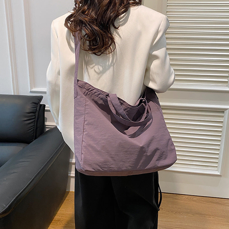 Women's New Portable Canvas Hand-held Pocket Large-capacity Leisure Joker Shoulder Slung Tote Bag